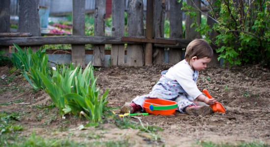 Baby playing with dirt