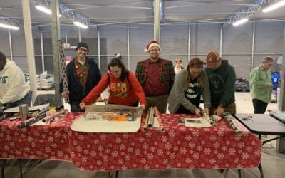 Monroe Office Partners with Hometown Heroes to Provide Gifts to Children