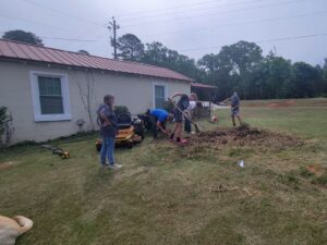 LaGrange GA teammates completing a full yard cleanup for a customer who needed support.